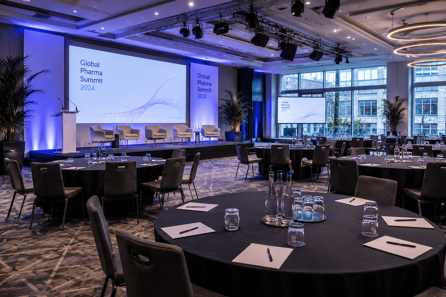 Premium conference room with rows of delegate seating